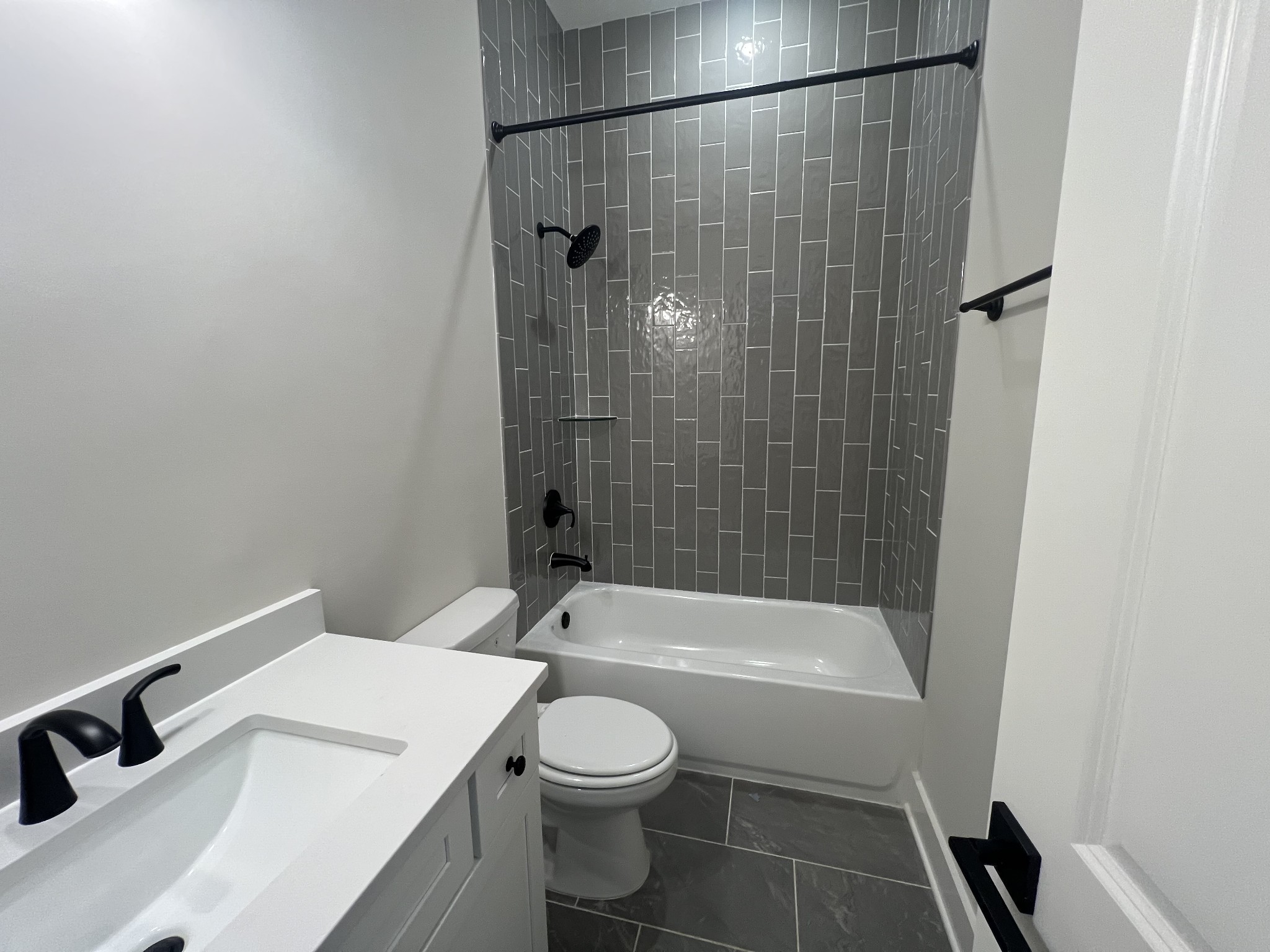 7285 Northwest Highway Fairview, TN 37062 - Photo 19 of 22 a bathroom with a sink a toilet and shower