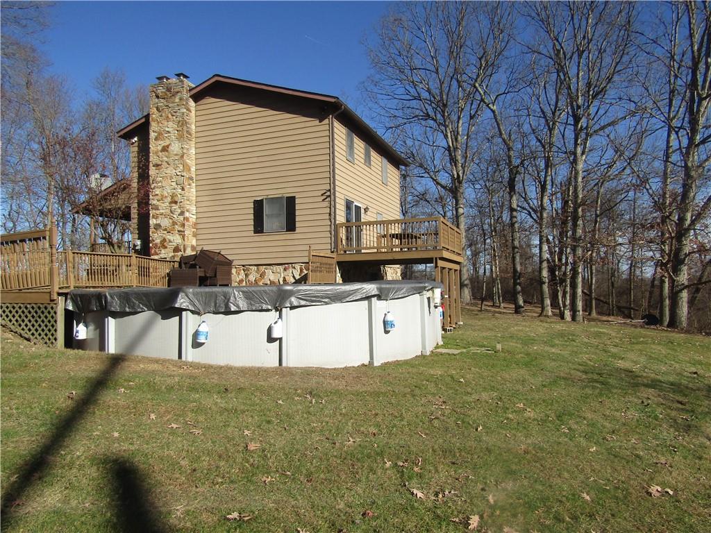 204 Castile Ridge Road Marianna, PA 15345 - Photo 16 of 17 a view of a house with backyard