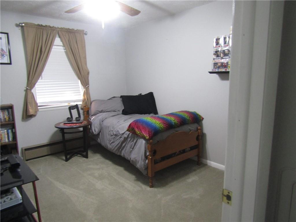 204 Castile Ridge Road Marianna, PA 15345 - Photo 9 of 17 a bedroom with a bed and window