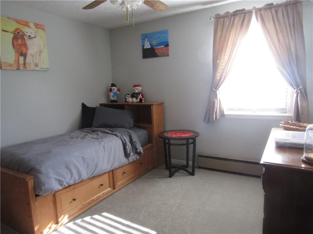 204 Castile Ridge Road Marianna, PA 15345 - Photo 10 of 17 a bedroom with a bed and a window