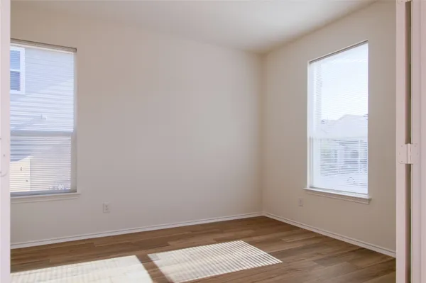 an empty room with windows