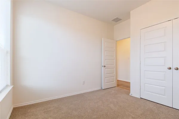 an empty room with closet
