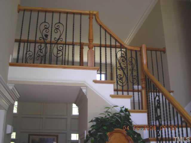 95 Oak Grove Church Road Youngsville, NC 27596 - Photo 12 of 25 Here is a view of the gorgeous staircase with wrought iron spindles! Stairs are also hardwood! Such a beautiful home in a wonderful community! Minutes to everything!