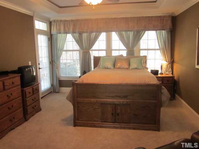 95 Oak Grove Church Road Youngsville, NC 27596 - Photo 15 of 25 First floor master suite features include phone, cable, trey ceiling, ceiling fan, drop crown for rope lighting if you want to installed!