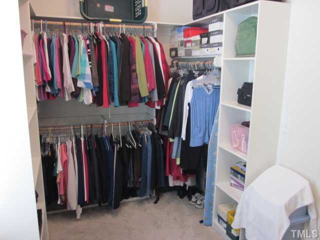 95 Oak Grove Church Road Youngsville, NC 27596 - Photo 16 of 25 Nice large walk in closet completes the master suite! Great first floor master suite in this wonderful home! No city taxes in this wonderful community!