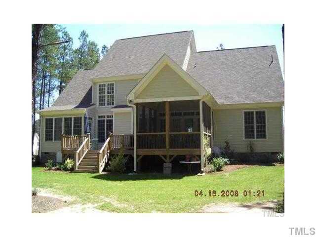 95 Oak Grove Church Road Youngsville, NC 27596 - Photo 3 of 25 Lovely view of the deck and screened porch combo! Screened porch features bead board ceiling and ceiling fan! This area adds so much room for entertaining family and friends for a summer afternoon cookout!