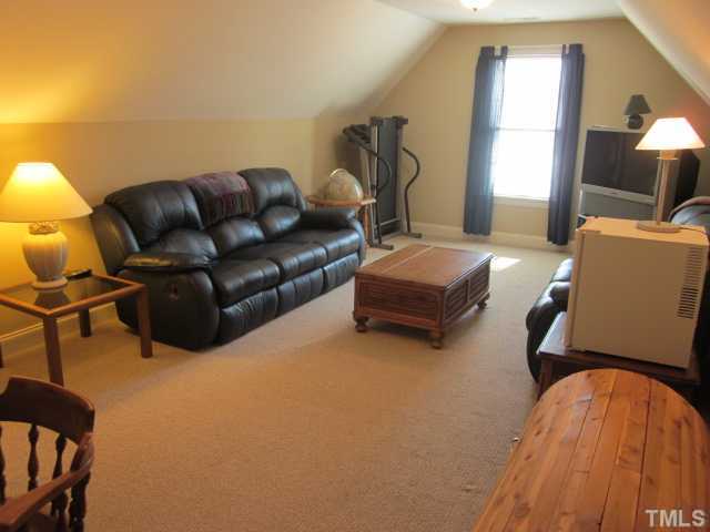 95 Oak Grove Church Road Youngsville, NC 27596 - Photo 21 of 25 This is your new bonus room or it could be used as another bedroom! Bonus room comes complete with a closet and is prewired for a ceiling fan!