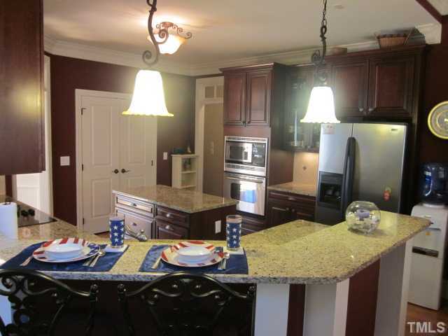 95 Oak Grove Church Road Youngsville, NC 27596 - Photo 9 of 25 One last view of this awesome kitchen! Cooking will not be a chore in this wonderful kitchen! Enjoy all the space this great kitchen has to offer while preparing meals for the family or dinner parties!