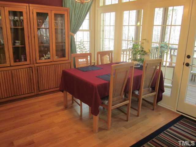 95 Oak Grove Church Road Youngsville, NC 27596 - Photo 10 of 25 Here is a view of your lovely breakfast area located off of the awesome kitchen! Breakfast area features beautiful hardwood floors and bead board ceiling that carrys to the screened in porch!