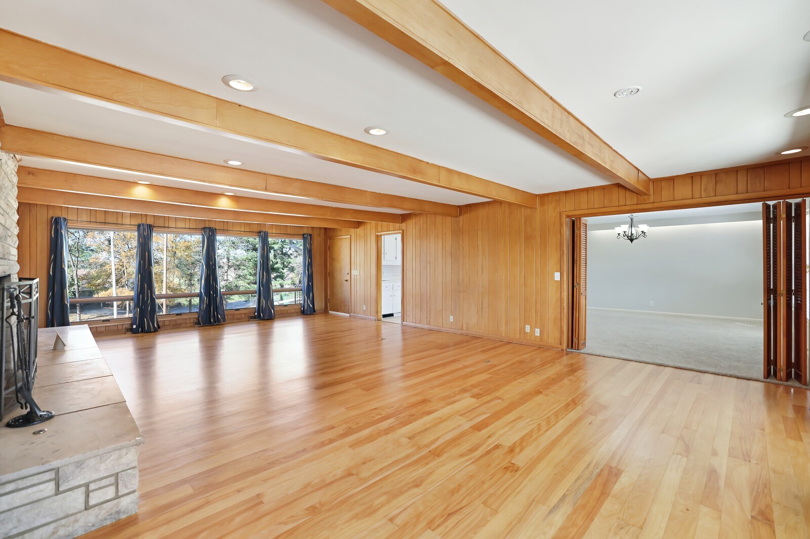 676 Ferguson Hill Road Lafayette, TN 37083 - Photo 7 of 89 a view of empty room with wooden floor and fan