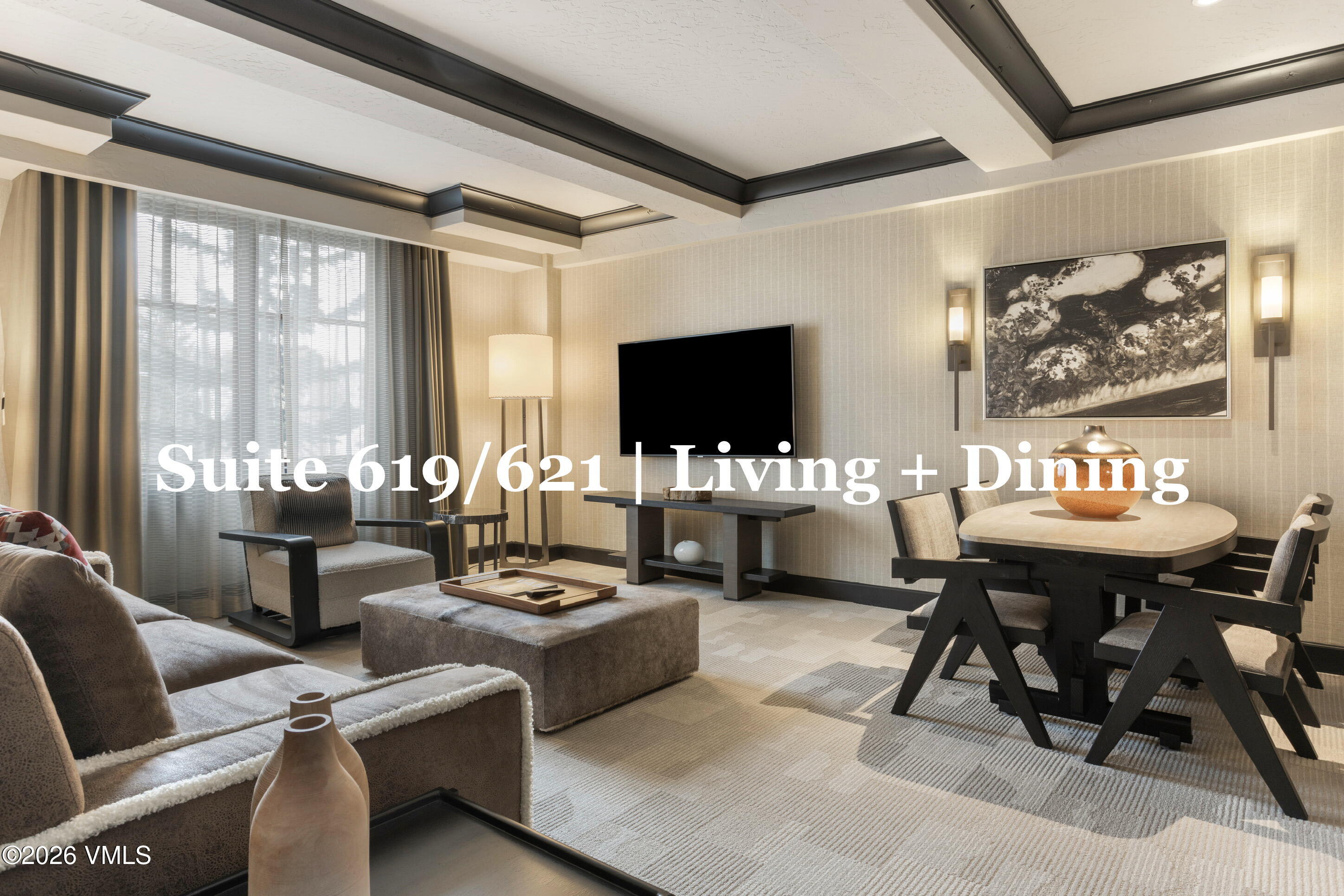 130 Daybreak Ridge Road, Unit HS619 Avon, CO 81620 - Photo 14 of 75 a living room with furniture and a flat screen tv