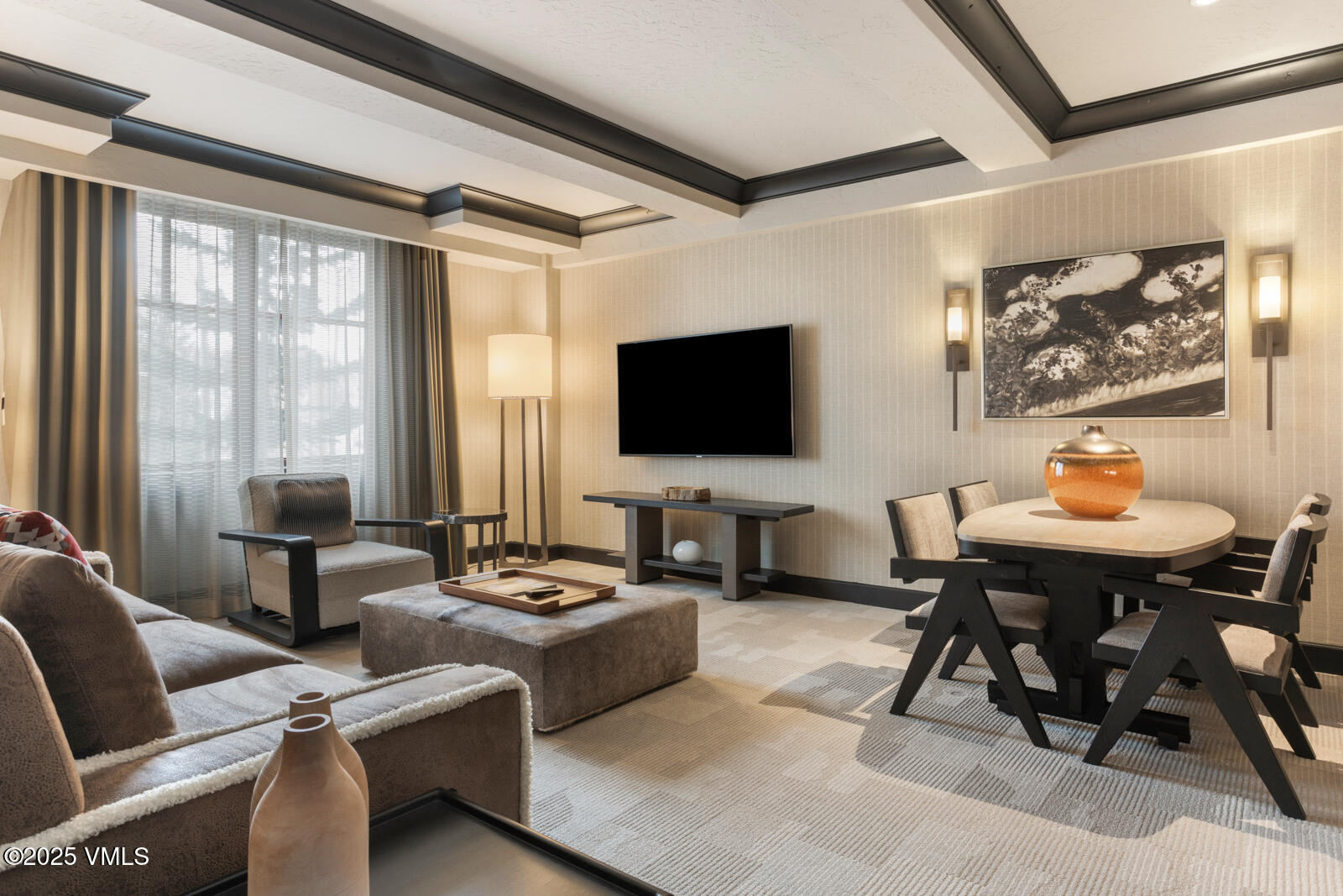 130 Daybreak Ridge Road, Unit HS619 Avon, CO 81620 - Photo 15 of 75 a living room with furniture and a flat screen tv