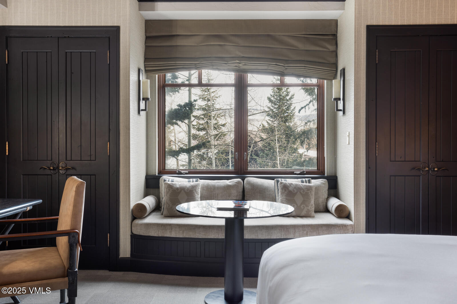 130 Daybreak Ridge Road, Unit HS619 Avon, CO 81620 - Photo 37 of 75 a bedroom with a bed and wooden floor