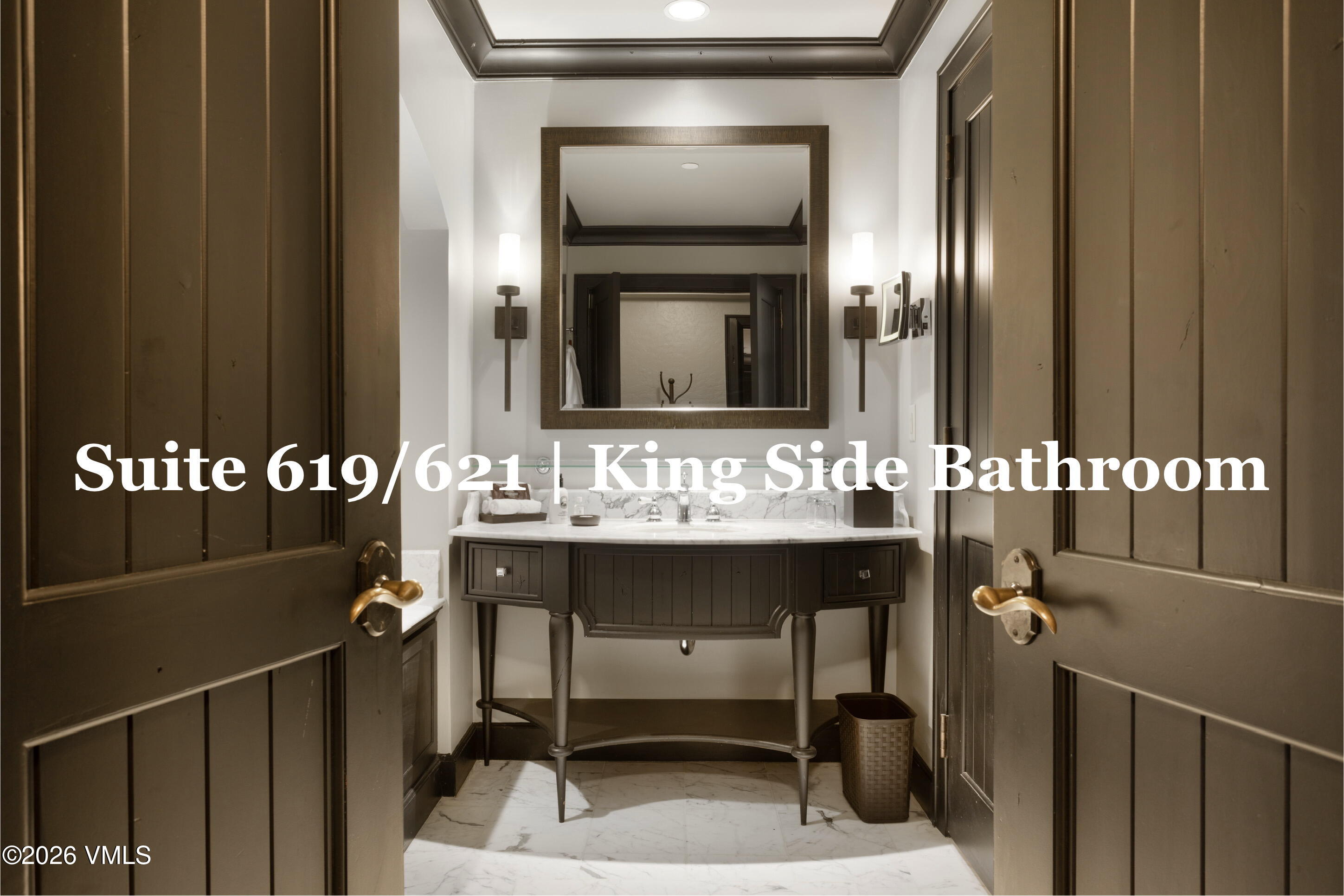 130 Daybreak Ridge Road, Unit HS619 Avon, CO 81620 - Photo 40 of 75 a bathroom with a sink and a mirror