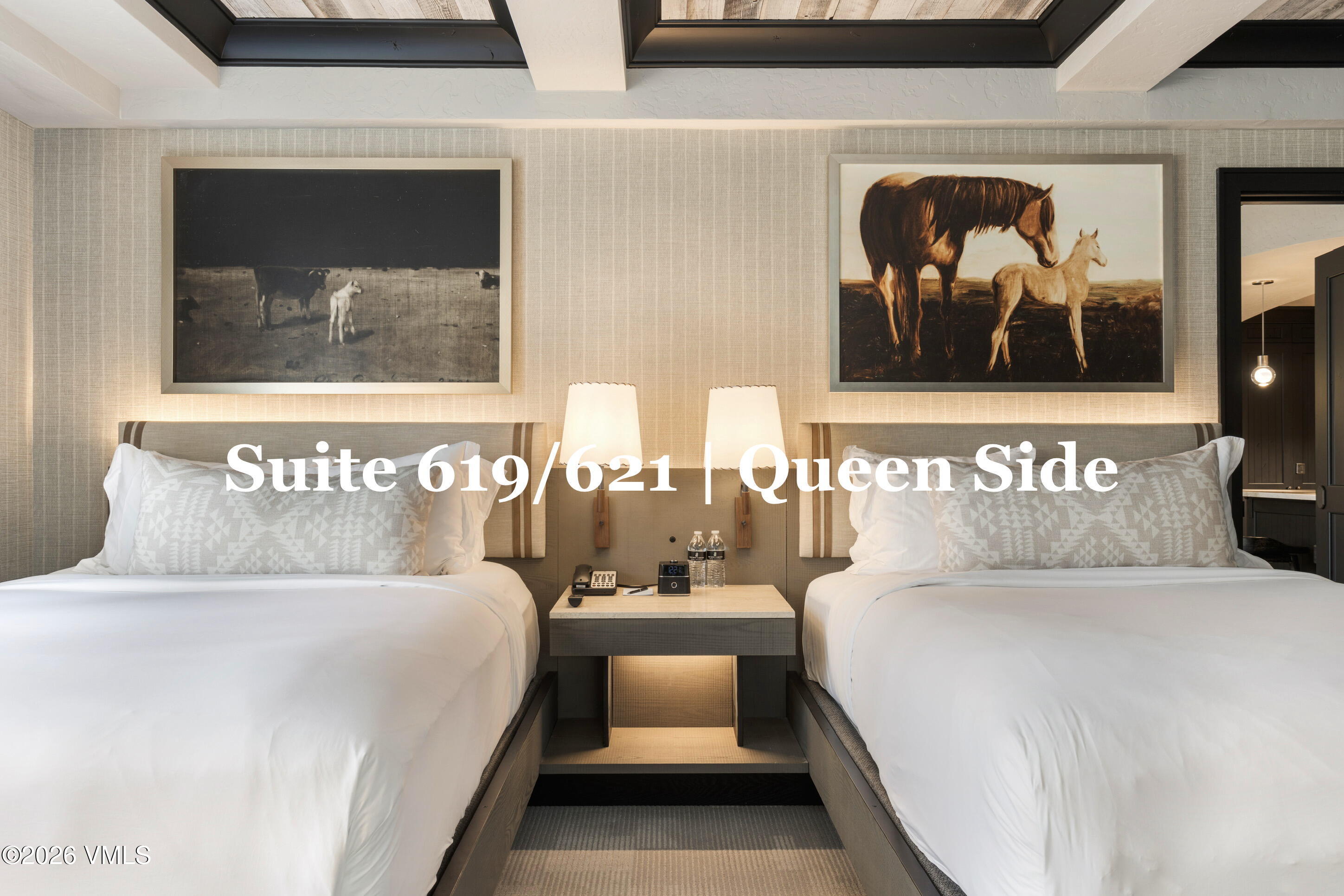 130 Daybreak Ridge Road, Unit HS619 Avon, CO 81620 - Photo 52 of 75 a bedroom with a bed and wall painting