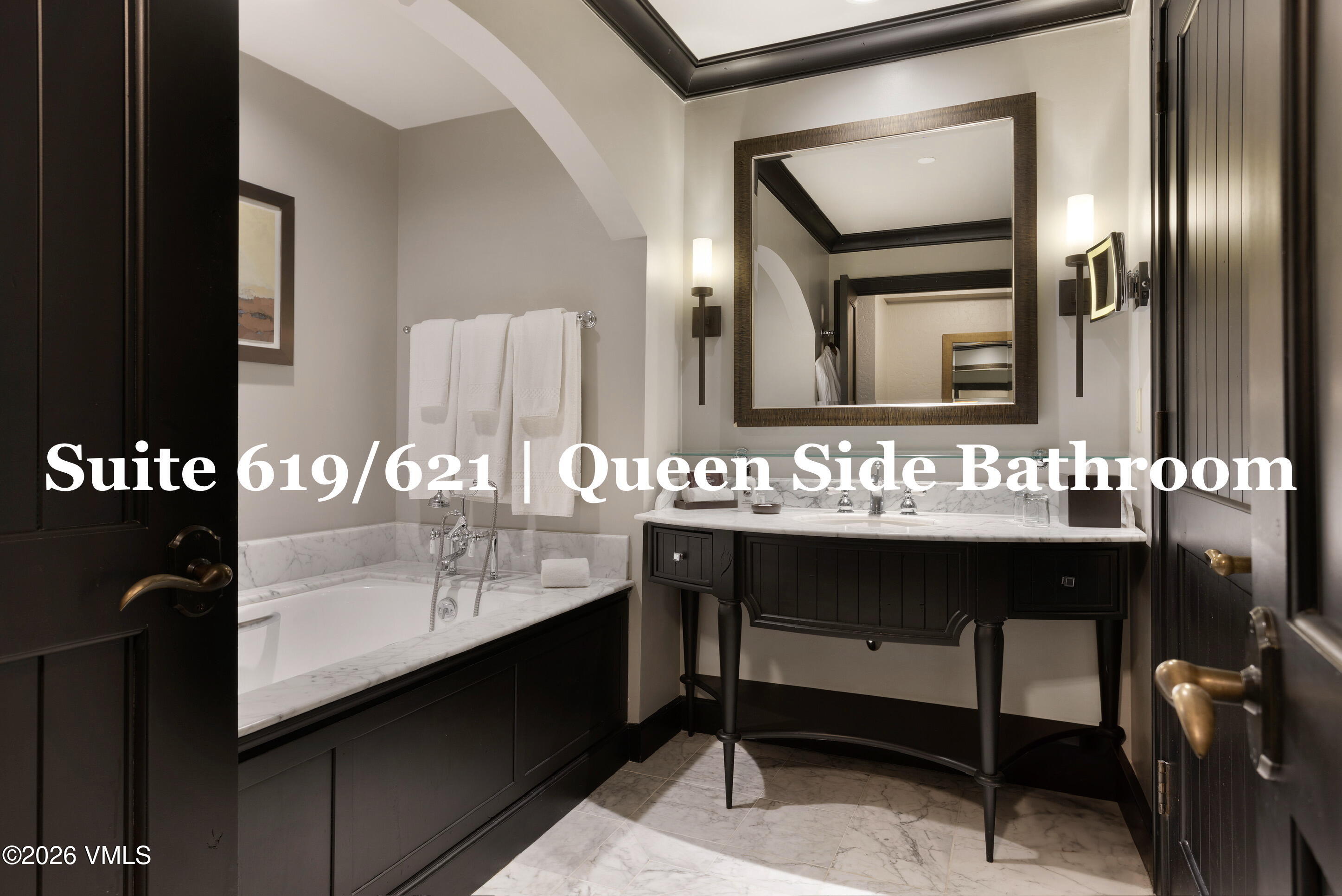 130 Daybreak Ridge Road, Unit HS619 Avon, CO 81620 - Photo 60 of 75 a bathroom with a sink and a mirror