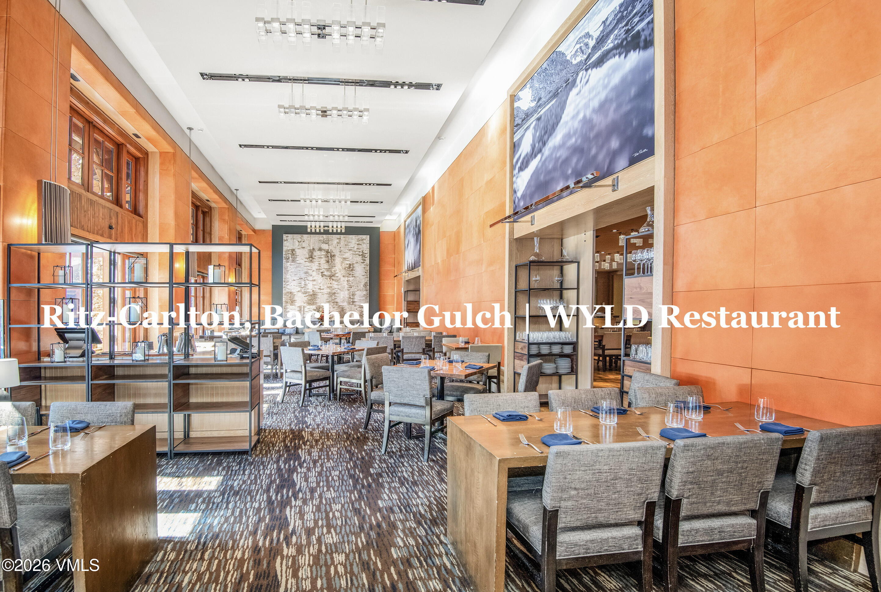 130 Daybreak Ridge Road, Unit HS619 Avon, CO 81620 - Photo 71 of 75 a outdoor space with lots of tables a garden and couches