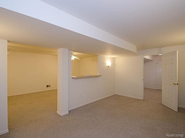 48593 West 9 Mile Road Northville, MI 48167 - Photo 27 of 56 Basement Rec Rooms with separate rooms and Walk-in-closet.