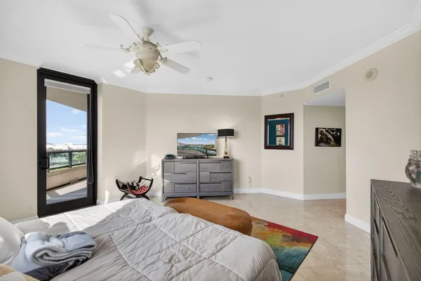 a view of a swimming pool with a lounge chair