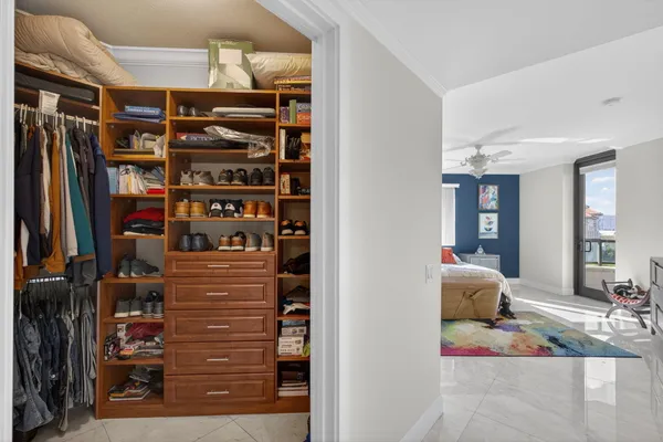 a view of a swimming pool with a lounge chair