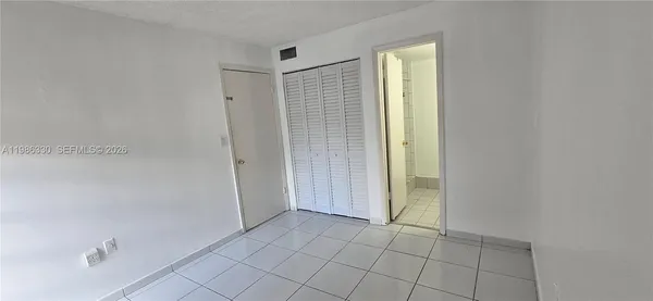 a view of an empty room with window