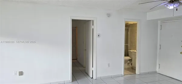 a view of a hallway with closet area
