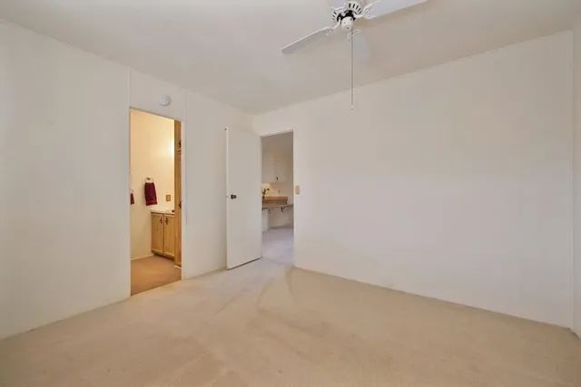 a view of a small space with a fan