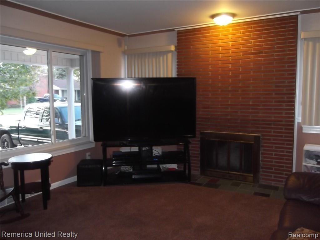 7860 North Henry Ruff Road Westland, MI 48185 - Photo 49 of 50 NATURAL FIREPLACE IN LARGE LIVING ROOM