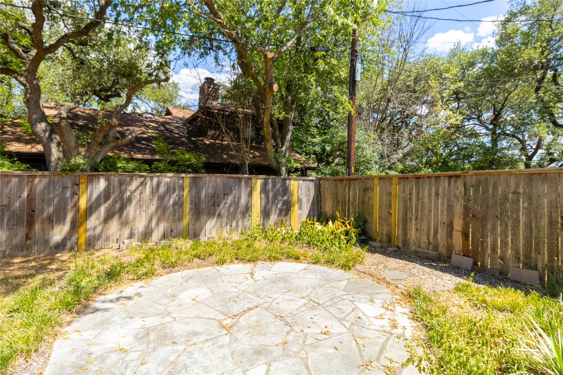 5839 Secrest Drive Austin, TX 78759 - Photo 28 of 34 Fenced backyard featuring a patio area