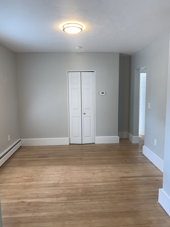 230 Prospect Street Athol, MA 01331 - Photo 12 of 19 a view of an empty room with wooden floor