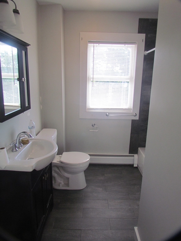 230 Prospect Street Athol, MA 01331 - Photo 17 of 19 a bathroom with a sink toilet and mirror