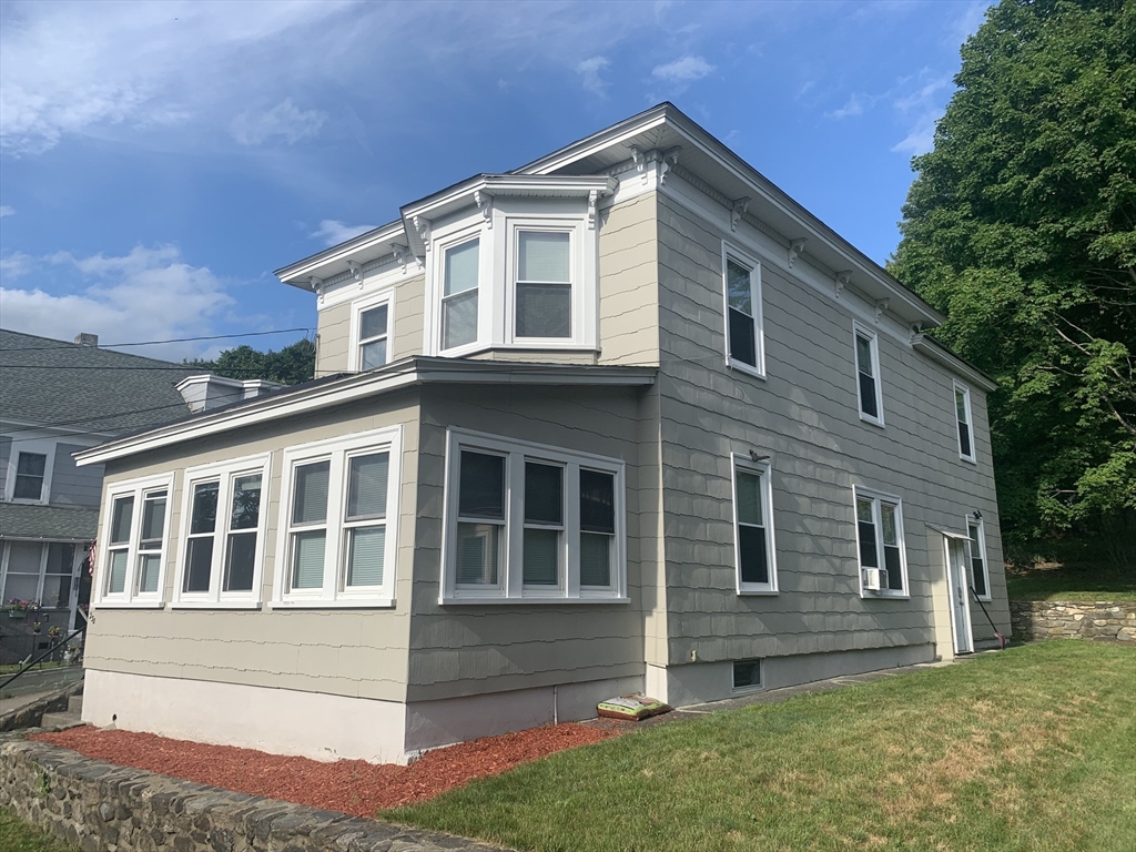 230 Prospect Street Athol, MA 01331 - Photo 2 of 19 a front view of a house with a garden