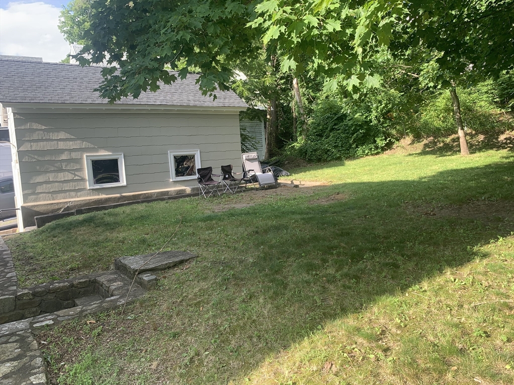 230 Prospect Street Athol, MA 01331 - Photo 5 of 19 a view of a house with backyard and sitting area
