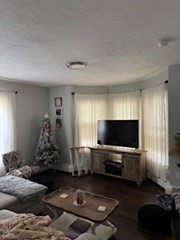 230 Prospect Street Athol, MA 01331 - Photo 9 of 19 a living room with furniture and a flat screen tv
