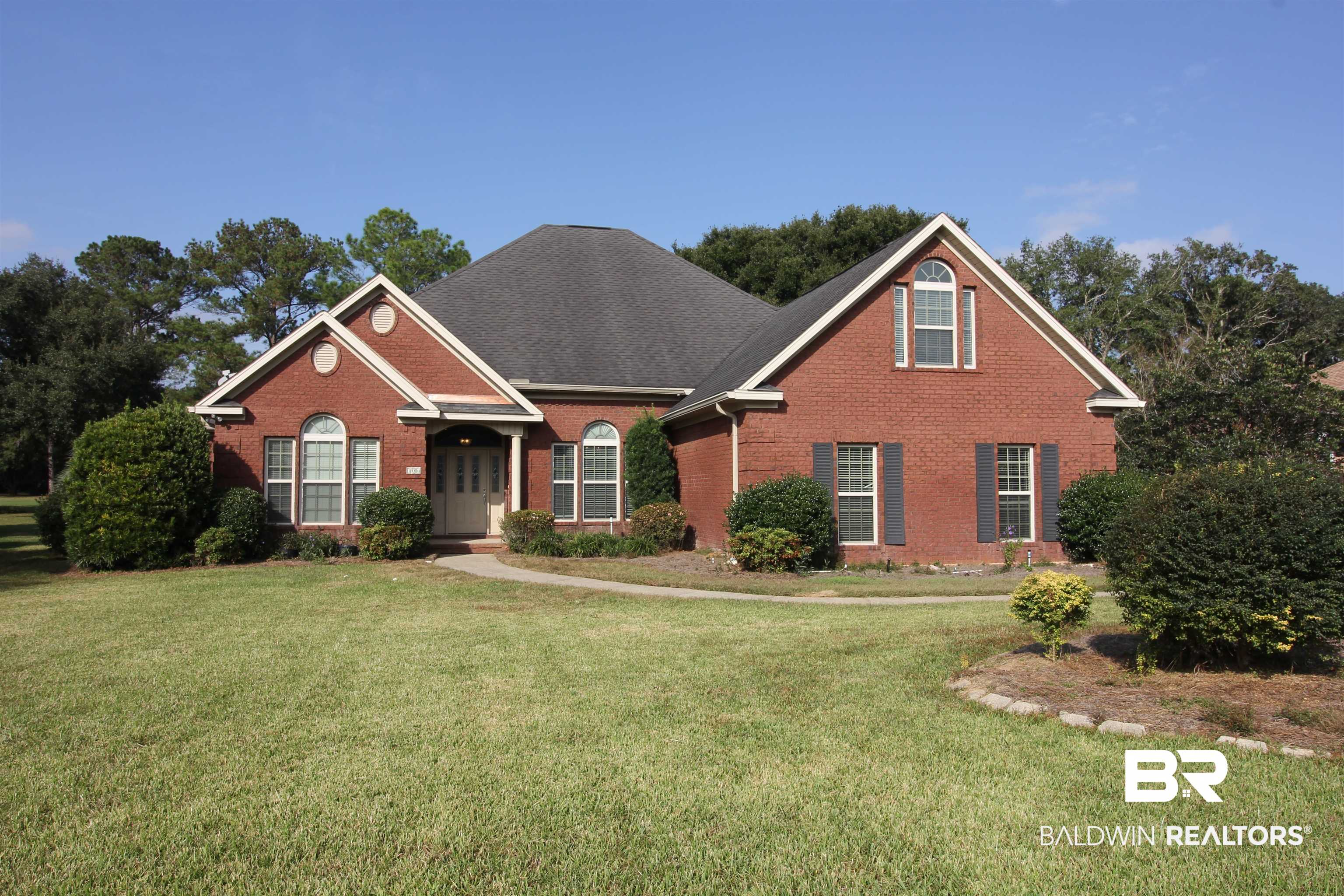 306 South Tee Drive Fairhope, AL 36532 - Photo 1 of 37 Front of property with a front lawn