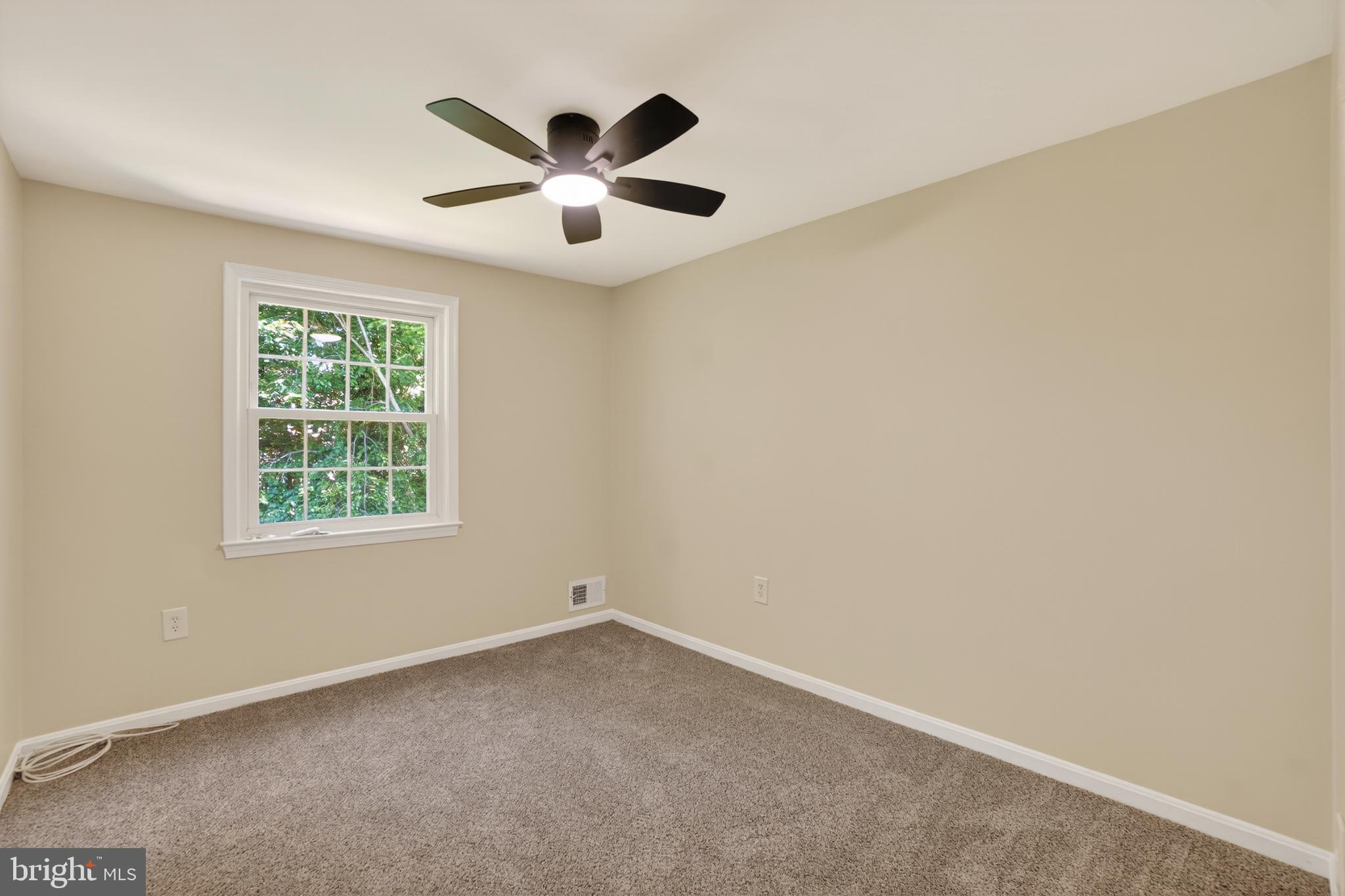1232 Palmer Road, Unit 111 Fort Washington, MD 20744 - Photo 27 of 45 an empty room with windows and fan