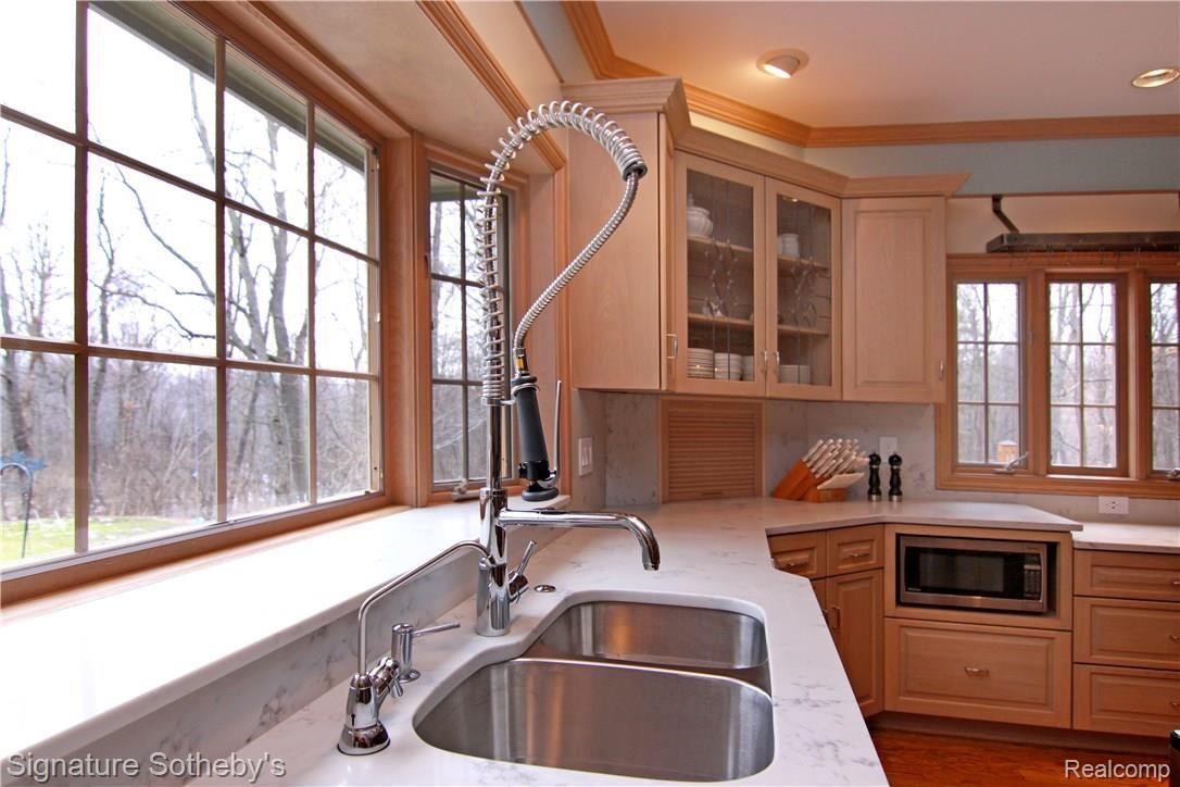 8400 Ridge Road Canton, MI 48187 - Photo 12 of 69 Sleek fixtures and quartz counters