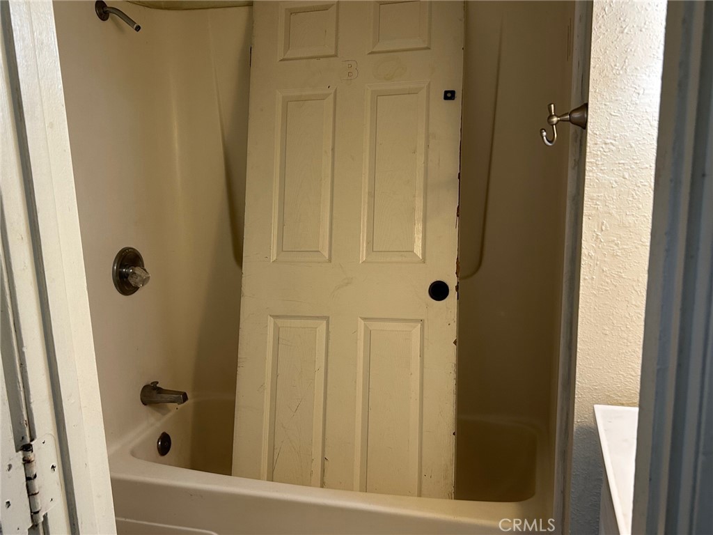 1406 West 7th Street Chico, CA 95928 - Photo 14 of 15 a bathroom with a shower