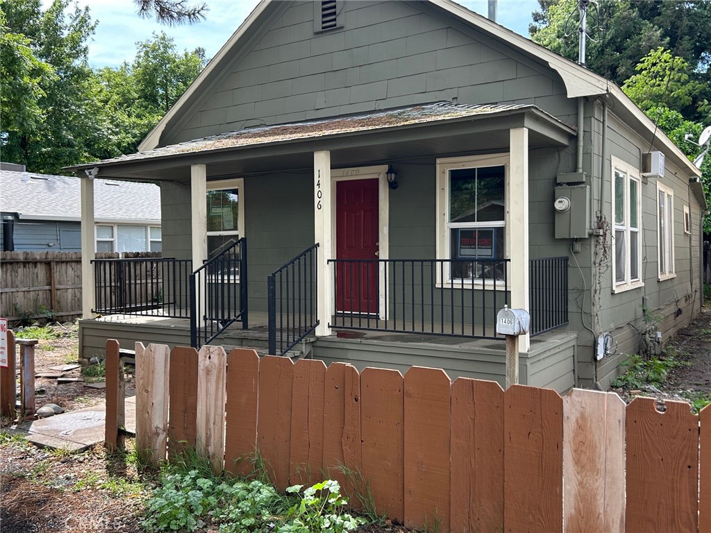 1406 West 7th Street Chico, CA 95928 - Photo 2 of 15 a front view of a house with street