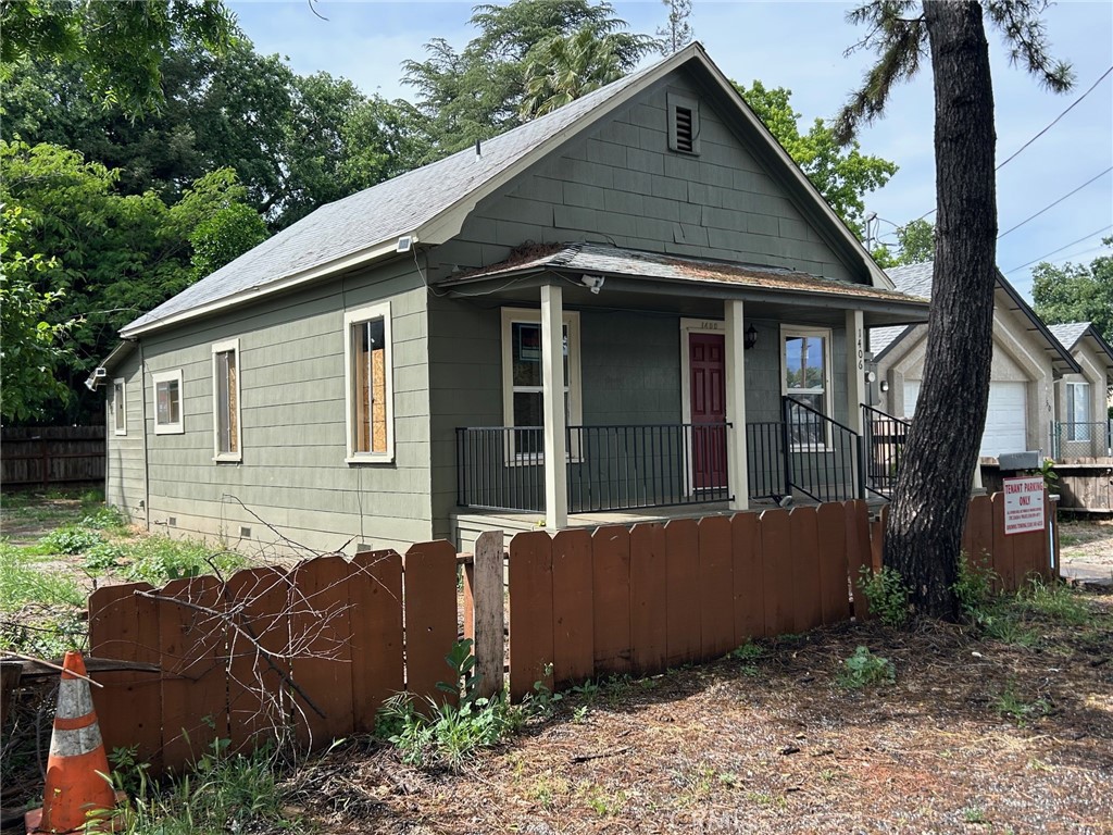 1406 West 7th Street Chico, CA 95928 - Photo 3 of 15 a view of a house with a yard and furniture