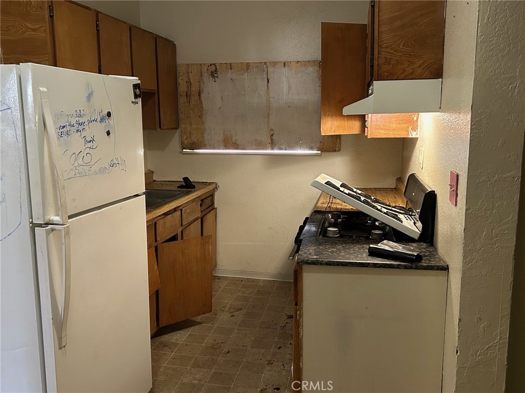 1406 West 7th Street Chico, CA 95928 - Photo 8 of 15 a close view of a refrigerator in kitchen and a refrigerator
