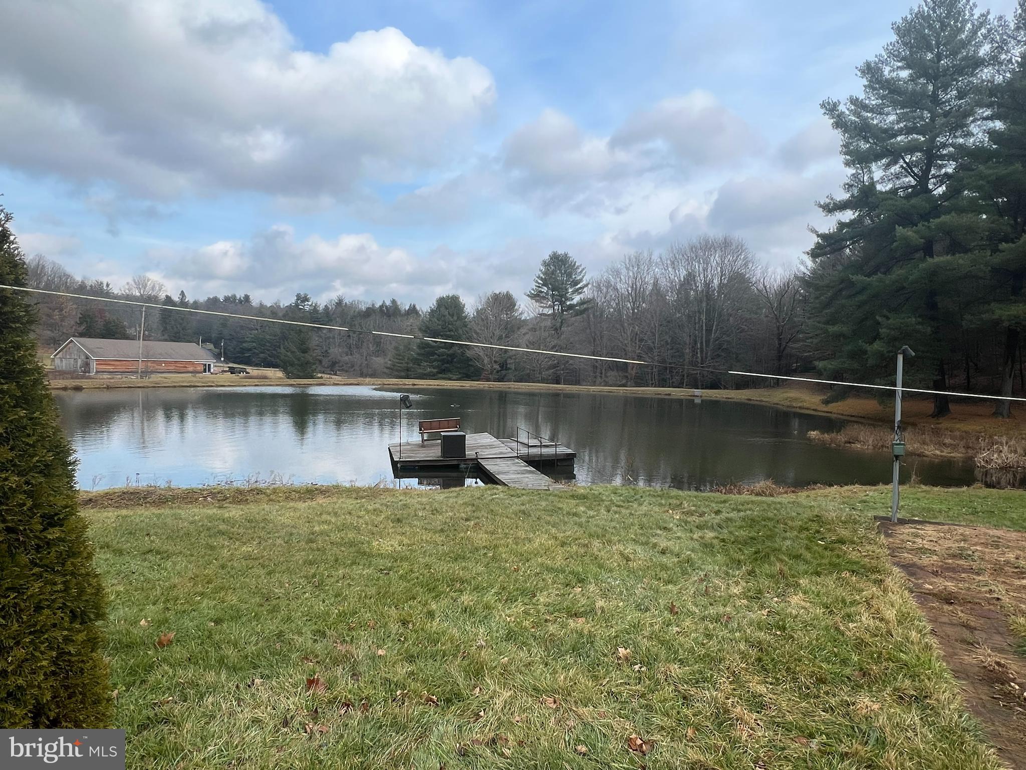 540 McKenzie Road Lonaconing, MD 21539 - Photo 9 of 16 a view of a lake with houses in the back