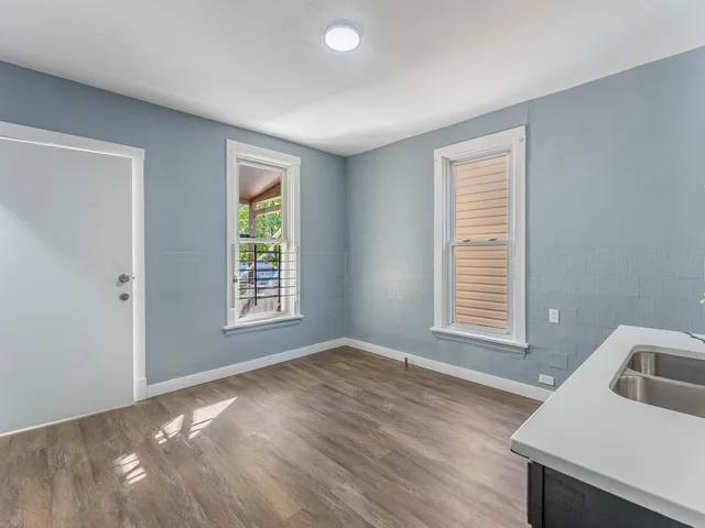 a view of an empty room with a window