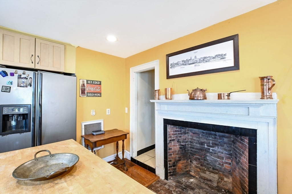 16 Middle Street Fairhaven, MA 02719 - Photo 7 of 34 a living room with furniture and a fireplace