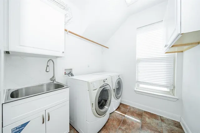 a utility room with dryer and washer