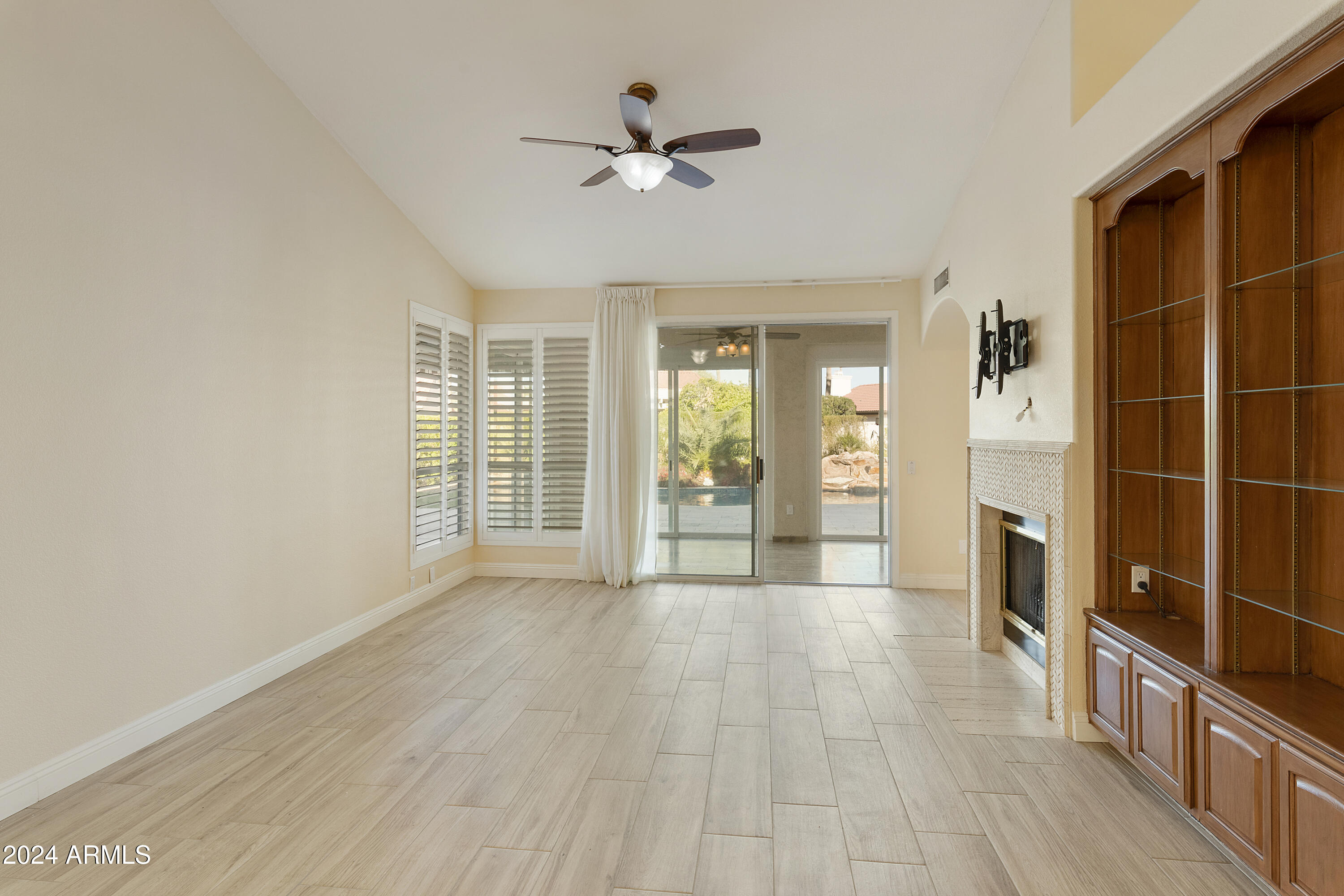 25418 East Spring Creek Road Chandler, AZ 85248 - Photo 12 of 52 Family Room - 2 sided FP