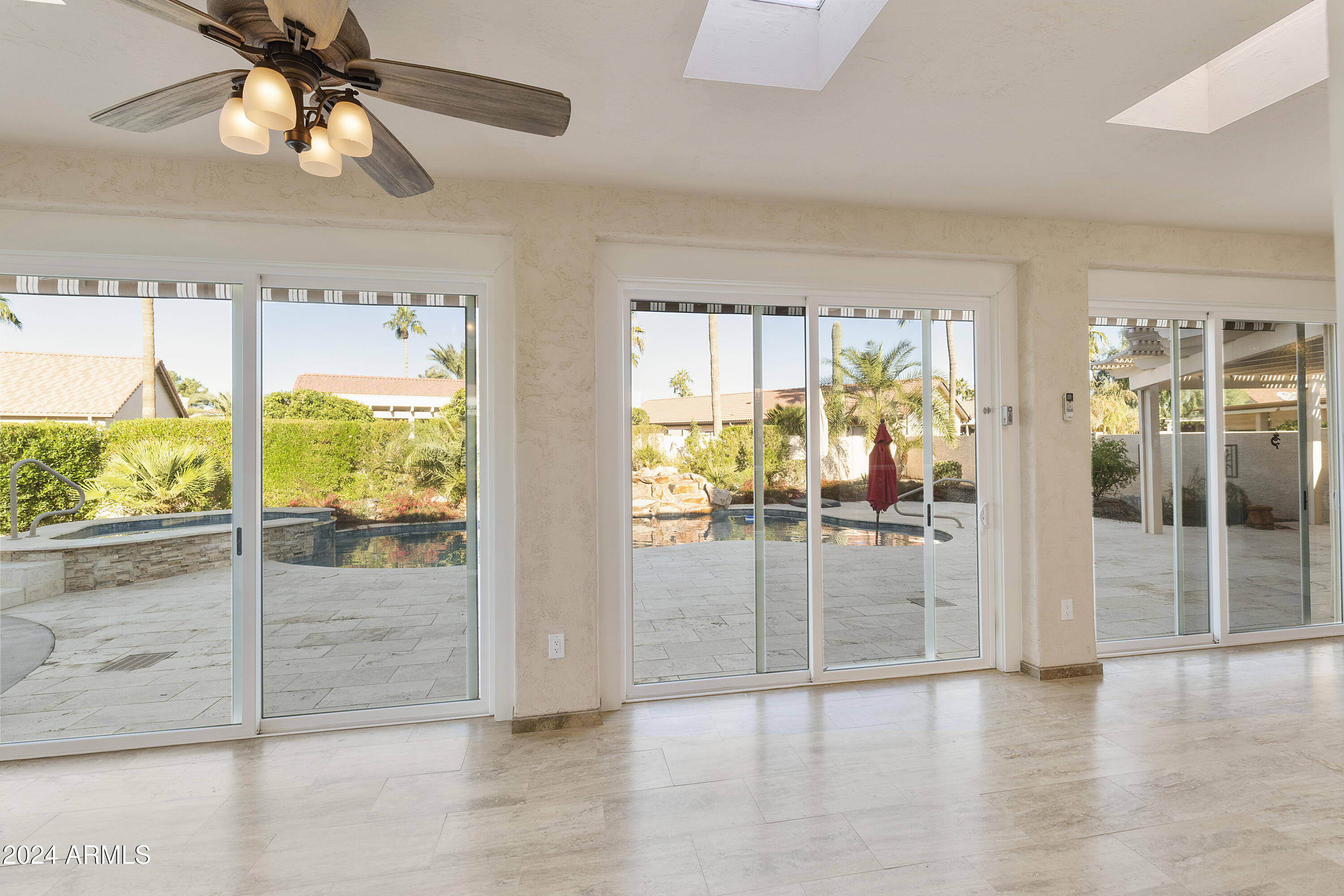 25418 East Spring Creek Road Chandler, AZ 85248 - Photo 22 of 52 Arizona Room access to patio/pool area
