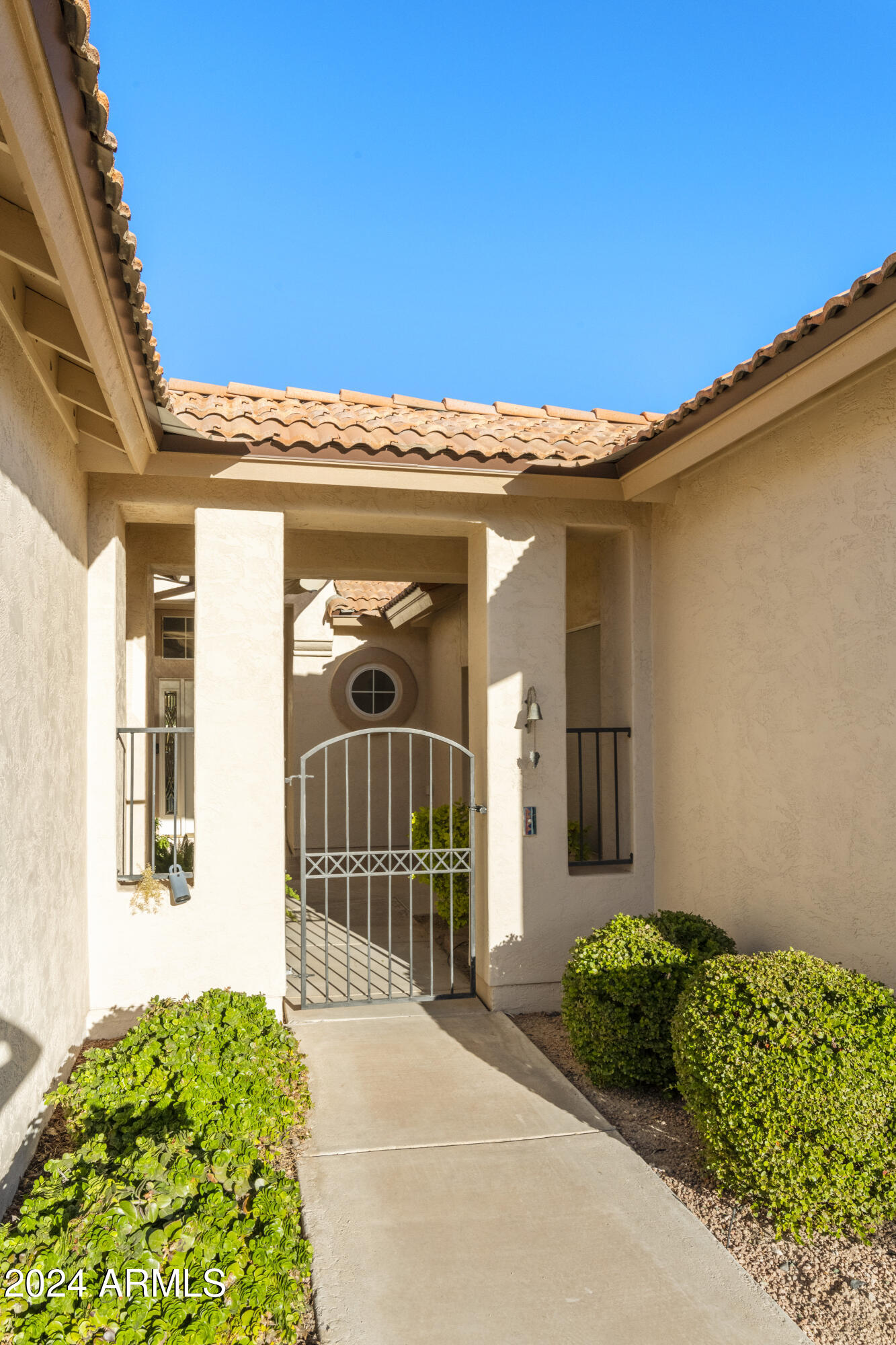 25418 East Spring Creek Road Chandler, AZ 85248 - Photo 4 of 52 Walkway to courtyard entry
