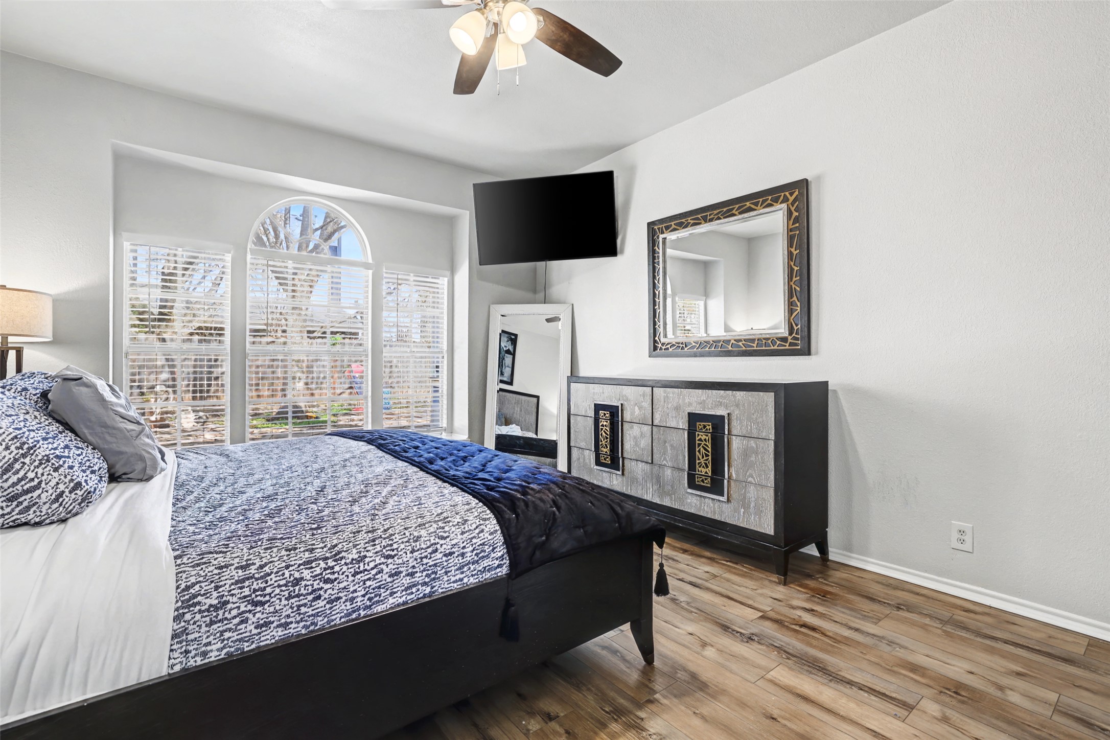 1109 Pebble Brook Road Cedar Park, TX 78613 - Photo 18 of 40 Bedroom featuring wood finished floors and ceiling fan