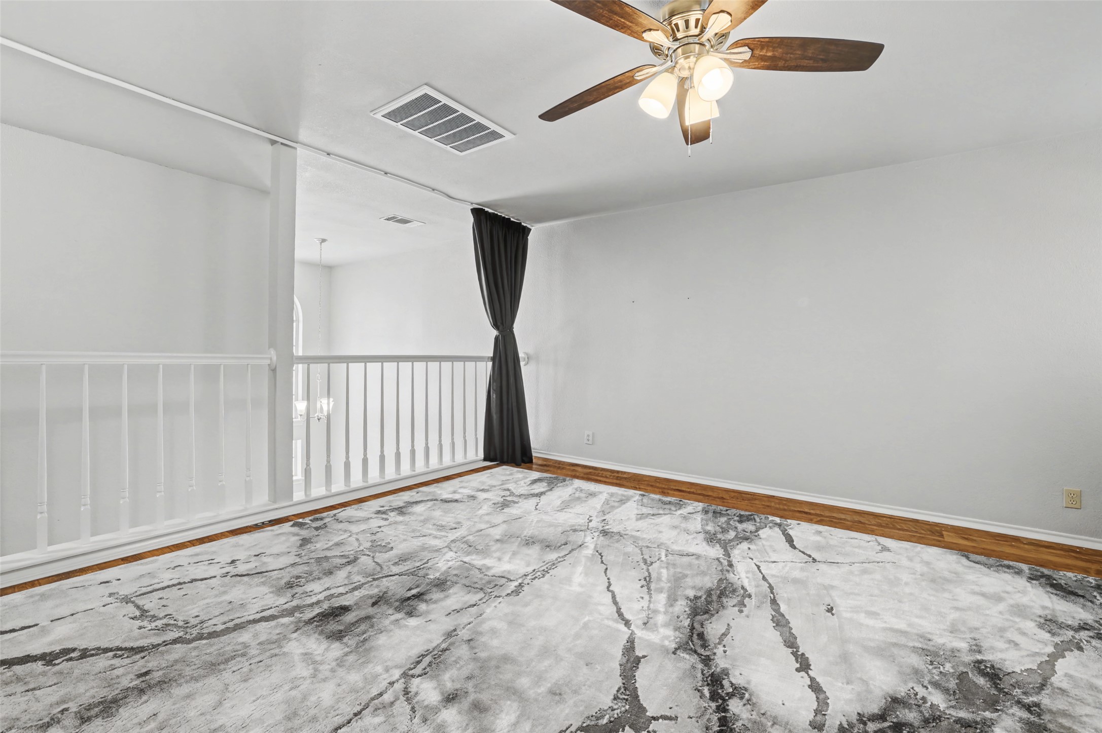 1109 Pebble Brook Road Cedar Park, TX 78613 - Photo 24 of 40 Spare room featuring ceiling fan and wood finished floors